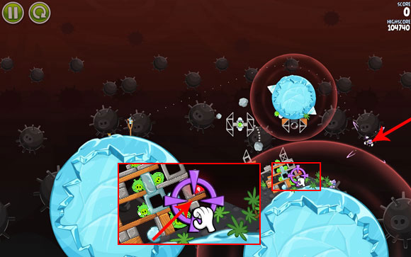 When the bird passes the planet and finds itself roughly at the indicated spot, change its course by pointing it at the wooden block on the close-up - Level 3-13 - Danger Zone - Angry Birds Space - Game Guide and Walkthrough