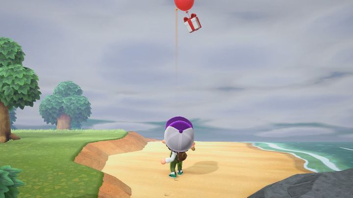 Use your slingshot and the gift will be yours! - ACNH: Gift - how to knock it down? - Items - Animal Crossing New Horizons Guide