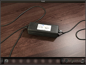 Agent takes a closer look at the feeder (zoom in) she flips it over to check the feed type and disconnects the cable on the right - Paris, France, April 15-17, 2008 - Hotel - April 15-17, 2008 - Art of Murder: Hunt For The Puppeteer - Game Guide and Walkthrough