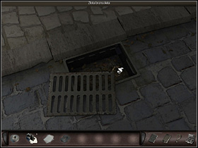 She closes the toolbox and goes back to the street where she uses the screwdriver to lift the grate and picks up the gold bracelet with the name