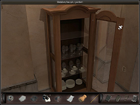 She goes under the staircase to learn that the personnel exit (on the left) is closed - Paris, France, April 15-17, 2008 - Hotel - April 15-17, 2008 - Art of Murder: Hunt For The Puppeteer - Game Guide and Walkthrough