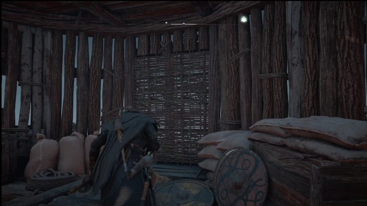 Way is blocked by a wooden blockade - simply hit it with a melee weapon or a bow - AC Valhalla Crossover Stories: Haunting of Neist Point - Side missions - Assassins Creed Valhalla Guide and Walkthrough