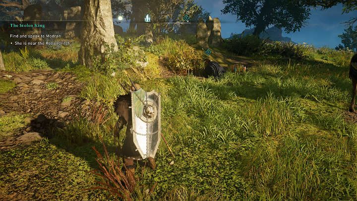 Modron is waiting for you by the stone boulders near Rollendritch - Assassins Creed Valhalla: The Stolen King - Glowecestrescire - Assassins Creed Valhalla Guide and Walkthrough