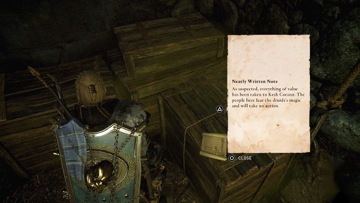 Once you have cleared the trade post, read the note lying on the wooden box in one of the side rooms in the location pictured in the image above - AC Valhalla Wrath of the Druids: The Ivory Post - Side quests - Assassins Creed Valhalla Guide and Walkthrough