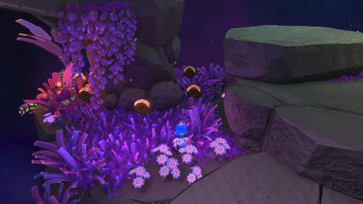 Stepping on the purple grass will cause coins to appear - Astros Playroom: Deep Dataspace - walkthrough - SSD Speedway - Astros Playroom Guide