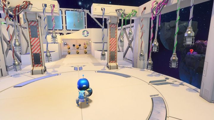 Deal with the next wave of enemies and smash the glass between the stairs to collect the coins - Astros Playroom: Deep Dataspace - walkthrough - SSD Speedway - Astros Playroom Guide