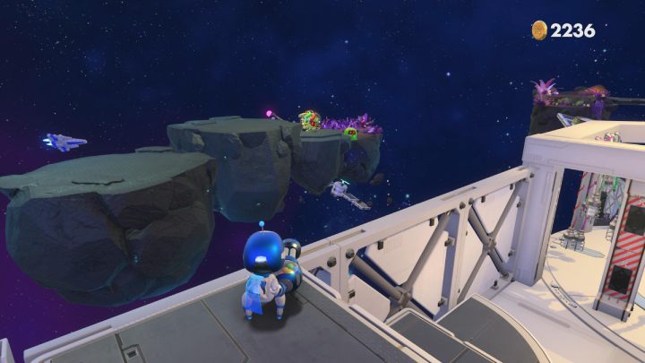 Once you jump on a rock, some opponents will appear - Astros Playroom: Deep Dataspace - walkthrough - SSD Speedway - Astros Playroom Guide