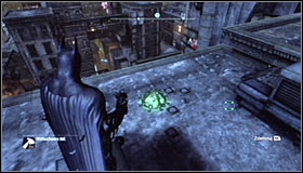 After planting three charges, return to where the cage is - Batman trophies (15-24) | Park Row - Park Row - Batman: Arkham City Game Guide