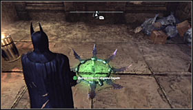 Fly back south and keep in mind that the last, third pressure plate, is on the ground #1 - Batman trophies (15-24) | Park Row - Park Row - Batman: Arkham City Game Guide