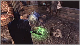 Jump over the fence, prepare the Remote Electrical Charge and shoot at the engine #1 to raise the gate - Batman trophies (25-36) | Park Row - Park Row - Batman: Arkham City Game Guide