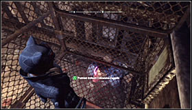 Head to the interactive grate #1, press A to open it and collect the Trophy #2 - Catwoman trophies | Park Row - Park Row - Batman: Arkham City Game Guide