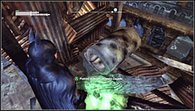 Turn on the Detective Mode thanks to which you should note that the wooden obstacle can be destroyed with Explosive Gel #1 - Batman trophies (11-18) | Amusement Mile - Amusement Mile - Batman: Arkham City Game Guide