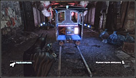 Take out the Remote Electrical Charge and shoot at the engine found inside a small locomotive #1 - Batman trophies (01-08) | Industrial District - Industrial District - Batman: Arkham City Game Guide