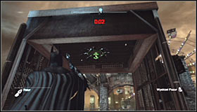 Quickly run to the edge and jump onto the lower ledge #1 - Batman trophies (26-37) | Industrial District - Industrial District - Batman: Arkham City Game Guide