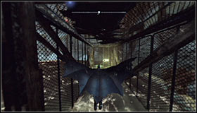 Jump off the ledge and after getting near enough to the cage, press the right trigger to activate the Dive Bomb #1 - Batman trophies (26-37) | Industrial District - Industrial District - Batman: Arkham City Game Guide