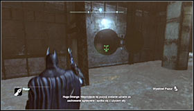 Turn south and find the interactive hatch - Batman trophies (01-09) | Bowery - Bowery - Batman: Arkham City Game Guide