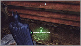 Equip the Line Launcher and shoot it at the wooden wall - Batman trophies (10-21) | Bowery - Bowery - Batman: Arkham City Game Guide