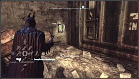 Approach the Trophy from the north, reaching a large TYGER gate #1 - Batman trophies (10-21) | Bowery - Bowery - Batman: Arkham City Game Guide