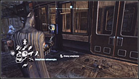Find the stairs leading onto the upper platform of the monorail #1 - Batman trophies (22-30) | Bowery - Bowery - Batman: Arkham City Game Guide