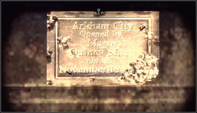 Examine the southern part of the balcony to find a plate informing of the date on which Arkham City was opened - Riddles | Bowery - Bowery - Batman: Arkham City Game Guide