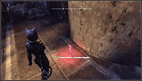 Jump onto the southernmost balcony, grabbing the balustrade #1 - Catwoman trophies | Bowery - Bowery - Batman: Arkham City Game Guide