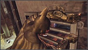 Note that hitting the question mark has led to the grate above him to raise - Batman trophies (16-24) | Steel Mill - Steel Mill - Batman: Arkham City Game Guide