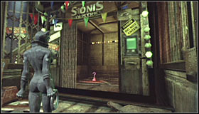 A locked gate guards access to the Trophy - Catwoman trophies | Steel Mill - Steel Mill - Batman: Arkham City Game Guide