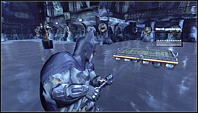 Prepare and shoot the Grapnel Gun towards the platform hanging above the water #1 - Rescue remaining undercover GCPD officers in the Museum | Main story - Main story - Batman: Arkham City Game Guide