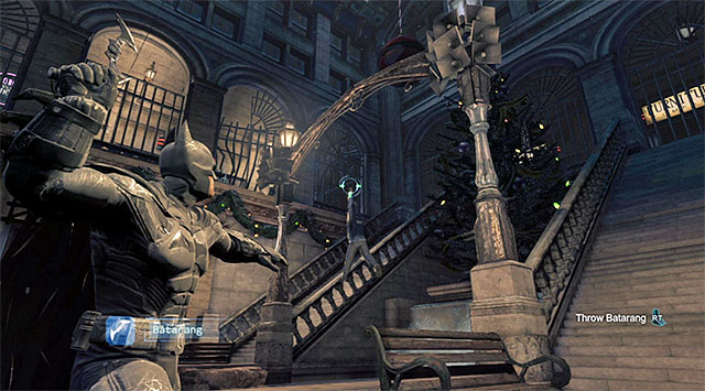 Use the batarangs to free the policeman - Shiva | Most Wanted - Most Wanted - Batman: Arkham Origins Game Guide