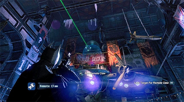 Select the newly-acquired Remote Claw from the inventory and aim it at one of the interactive points above the arena (the above screenshot) - Solve the crime scene inside Lacey Towers | Main storyline - Main storyline - Batman: Arkham Origins Game Guide