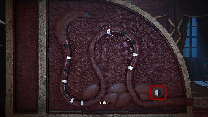 Move to the left side of the desk to encounter a second snake with an intricate set of white and black marks on its body - Riddle: the desk in library | Black Mirror Walkthrough - Chapter I - Black Mirror Guide