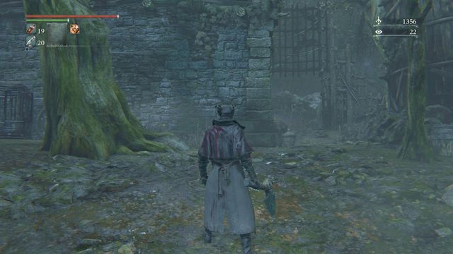 You can open the gate by going past the building from the left, between the dog cages. - Forbidden Woods | Walkthrough - Walkthrough - Bloodborne Game Guide & Walkthrough