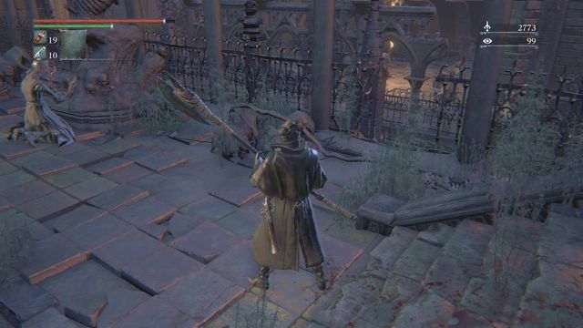 Note: Before you enter the chapel, on the big square, to the right of the fence (the screenshot) there is a gap that you can jump down across (carefully) - Yahargul, Unseen Village | Walkthrough - Walkthrough - Bloodborne Game Guide & Walkthrough