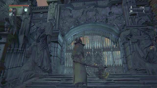 The gate across which you access the main yard. - How to open the main gate in Cathedral Ward in Bloodborne? | FAQ - FAQ - Bloodborne Game Guide & Walkthrough