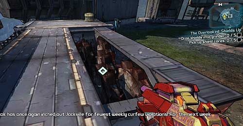 After you accept the mission, you will have to drop five shields into the grinder [2] from the above screenshot - The Overlooked: Shields Up | The Highlands side missions in Borderlands 2 - The Highlands - Borderlands 2 Game Guide
