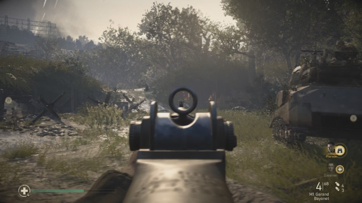 One of the tanks will shoot at the structure visible in the picture and create an entrance to it - Operation Cobra - Mementos, secrets and collectibles - Mementos - Call Of Duty WW2 Guide