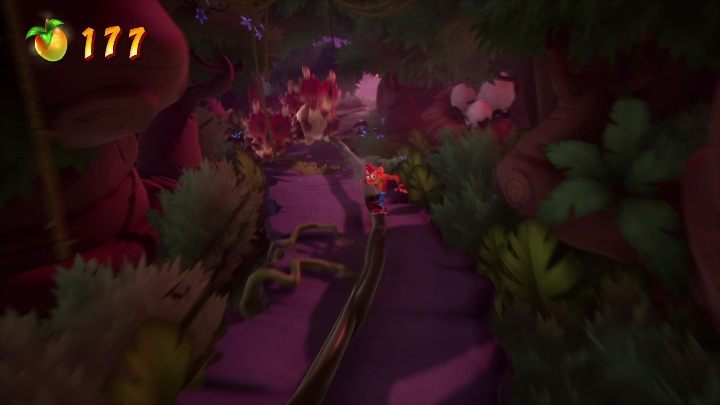 Another escape from the dinosaur involves a short slide down a branch, followed by a long run between magma - Crash 4: Dino Dash walkthrough - Eggipus Dimension, 88 Milion B.C.B - Crash 4 Guide, Walkthrough