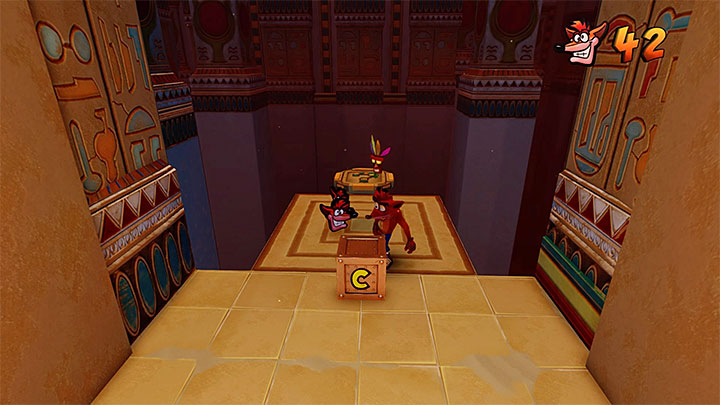 In the next corridor, watch out for the lit points on the ground which activate traps, and for green crates with nitroglycerine - Crash Bandicoot N. Sane Trilogy: Sphynxinator - Crash Bandicoot N. Sane Trilogy: Crash Bandicoot 3 - Egyptian location - Crash Bandicoot N. Sane Trilogy Game Guide