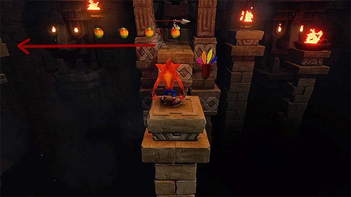 You will need to make your way through another corridor filled with stone blocks coming from the walls - Crash Bandicoot N. Sane Trilogy: Temple Ruins - Crash Bandicoot N. Sane Trilogy: Crash Bandicoot - Wumpa Island - Crash Bandicoot N. Sane Trilogy Game Guide