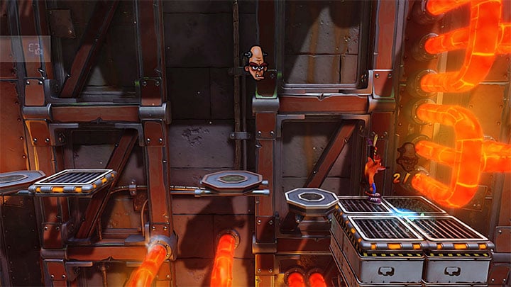 While exploring this part of the factory, stop on the larger ledge to the right, shown in the above screenshot - Crash Bandicoot N. Sane Trilogy: Heavy Machinery - Crash Bandicoot N. Sane Trilogy: Crash Bandicoot - Cortex Island - Crash Bandicoot N. Sane Trilogy Game Guide