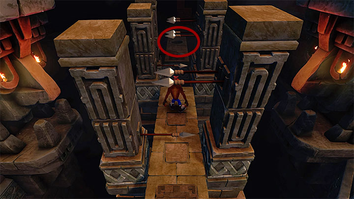 The second token can be found shortly after reaching the location with spears sticking out which is presented in the picture above - Crash Bandicoot N. Sane Trilogy: Cortexs Terrifying Trial - Crash Bandicoot N. Sane Trilogy: Crash Bandicoot - Crash Bandicoot N. Sane Trilogy Game Guide