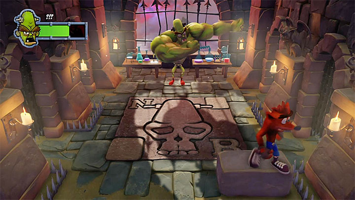 Jump on the stone brick and let the boss get close - Crash Bandicoot N. Sane Trilogy: Dr. Nitrus Brio Boss Fights - Crash Bandicoot N. Sane Trilogy: Crash Bandicoot boss fights - Crash Bandicoot N. Sane Trilogy Game Guide