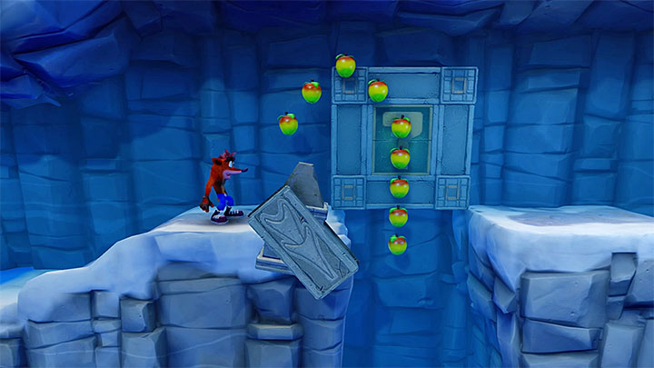 Slide over the ice at the right moment to avid the trap - Crash Bandicoot N. Sane Trilogy: Snow Biz - Crash Bandicoot N. Sane Trilogy: Crash Bandicoot 2 - Ice Warp Room - Crash Bandicoot N. Sane Trilogy Game Guide
