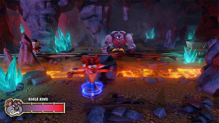 Throw the big rock back to the boss in order to hurt him (it will only work if the rock wont hit the cart) - Crash Bandicoot N. Sane Trilogy: Koala Konked - Crash Bandicoot N. Sane Trilogy: Crash Bandicoot - Crash Bandicoot N. Sane Trilogy Game Guide