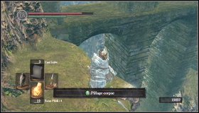 Approach the corpse at the well and harvest it for 3 Humanities - Firelink Shrine - Undead Burg | Walkthrough - Walkthrough - Dark Souls Game Guide & Walkthrough