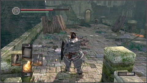 There is a bonfire in a tower to the left behind a bowman - Undead Burg - p. 1 | Walkthrough - Walkthrough - Dark Souls Game Guide & Walkthrough
