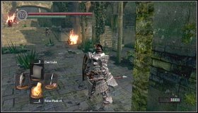 Keep going forwards but be careful, because after passing under an arch, an enemy with a spear will attack you from the right [1] - Undead Parish - p. 1 | Walkthrough - Walkthrough - Dark Souls Game Guide & Walkthrough