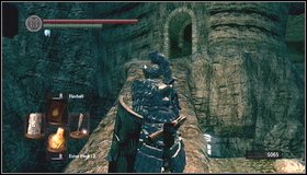 Right after entering the bluish part of the location with the waterfall, you can shoot the necromancer - The Catacombs - p. 1 | Walkthrough - Walkthrough - Dark Souls Game Guide & Walkthrough