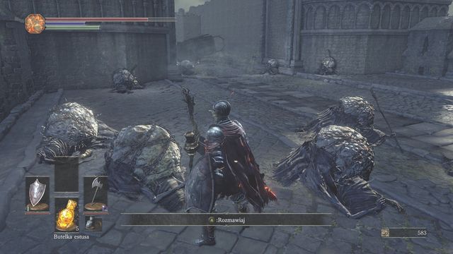 There are two more dogs behind the wagon, and an Alluring Skull next to the body - Undead Settlement - Walkthrough - Dark Souls III Game Guide & Walkthrough