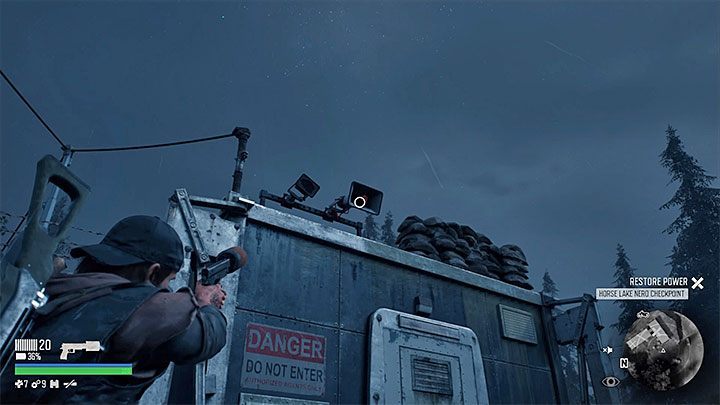 Before you take measures to unlock all the doors of the building, walk around the neighborhood and destroy all the speakers - Days Gone: How to unlock the access to NERO checkpoint? - Campaign - Days Gone Guide